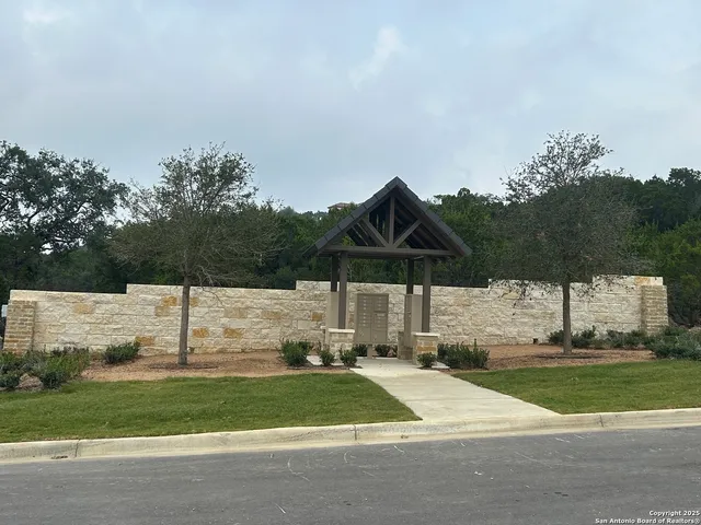 a large kitchen with a table and chairs
