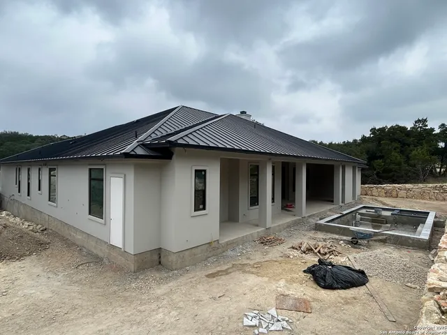 a front view of a house with yard