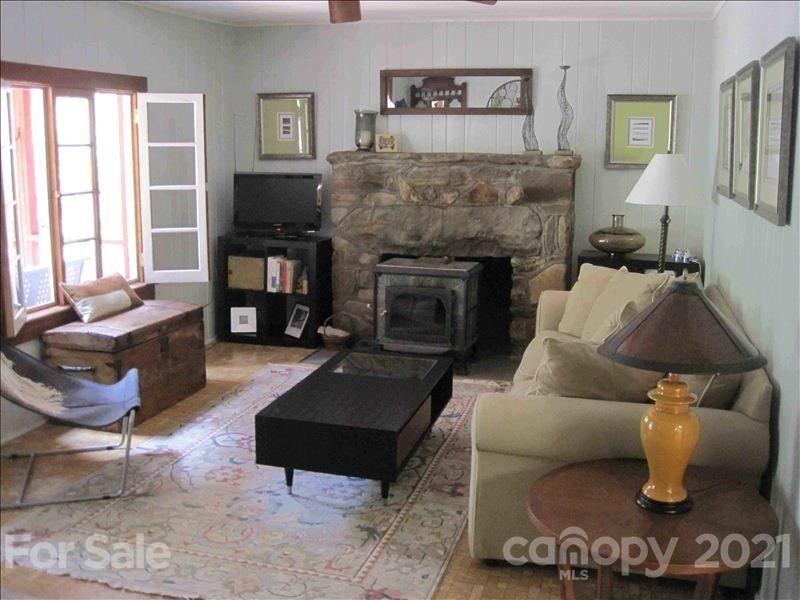 1 Rabbit Road Canton, NC 28716 - Photo 12 of 15 a living room with furniture and a fireplace