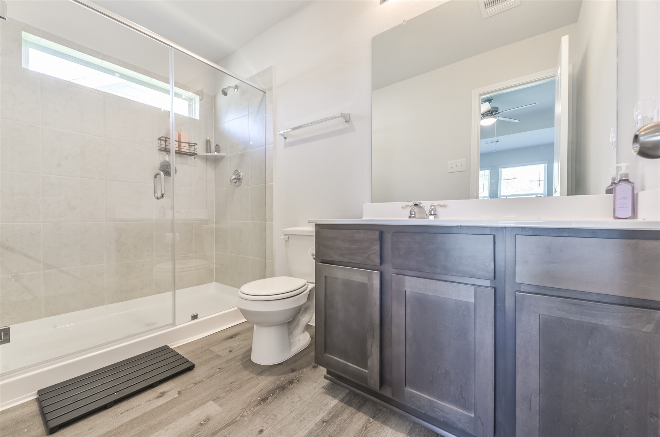 5522 Briana Dee Drive Rosharon, TX 77583 - Photo 26 of 37 a bathroom with a sink a toilet and shower