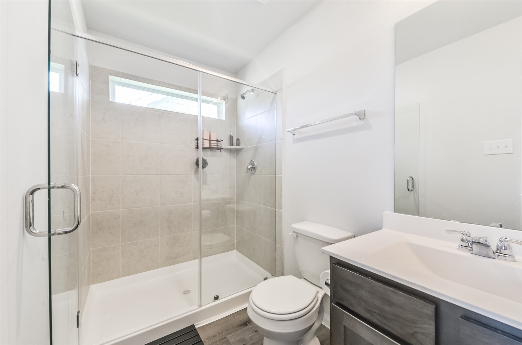 5522 Briana Dee Drive Rosharon, TX 77583 - Photo 27 of 37 a bathroom with a shower a toilet and sink