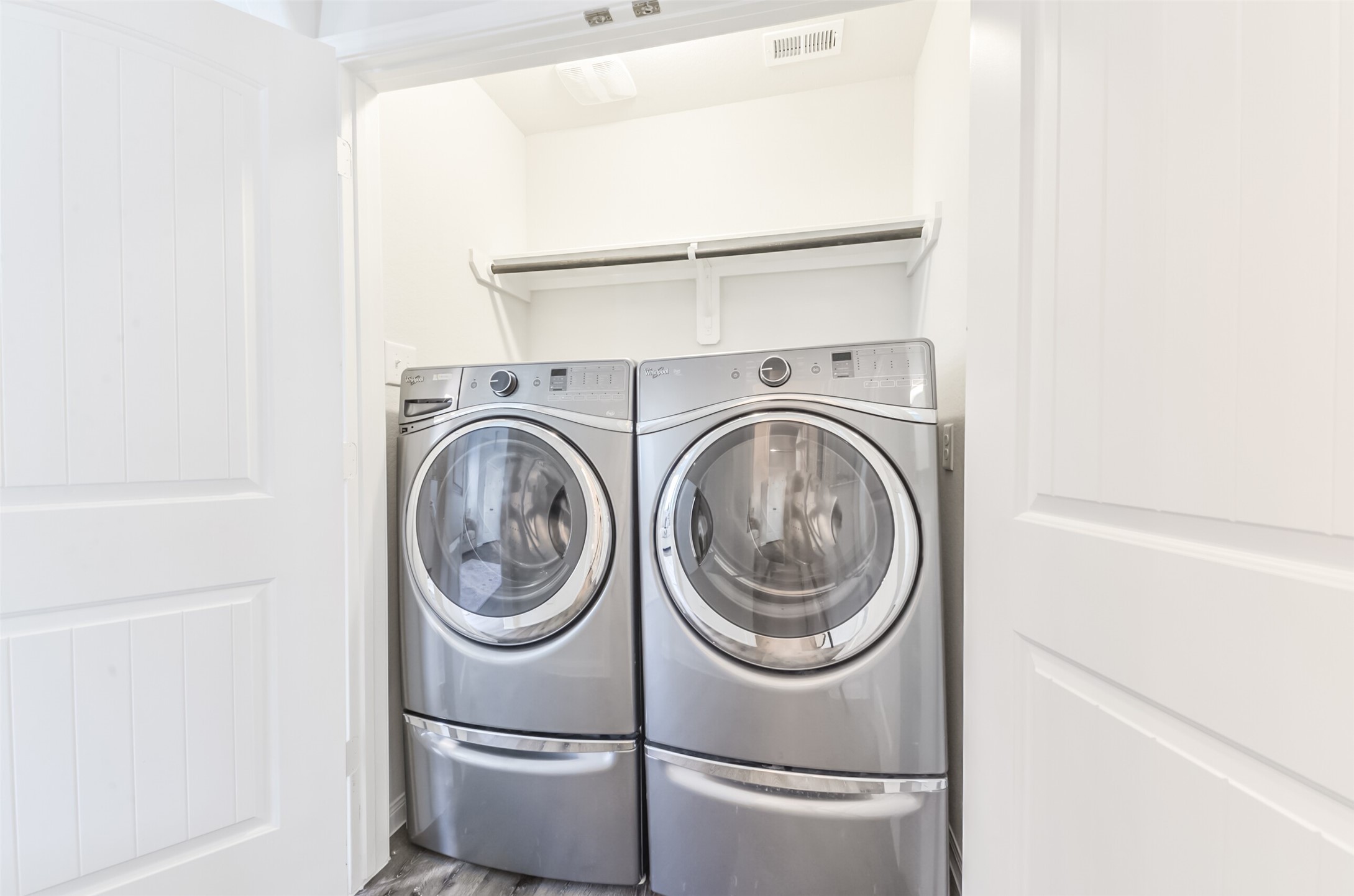 5522 Briana Dee Drive Rosharon, TX 77583 - Photo 34 of 37 a close up view of a washer and dryer