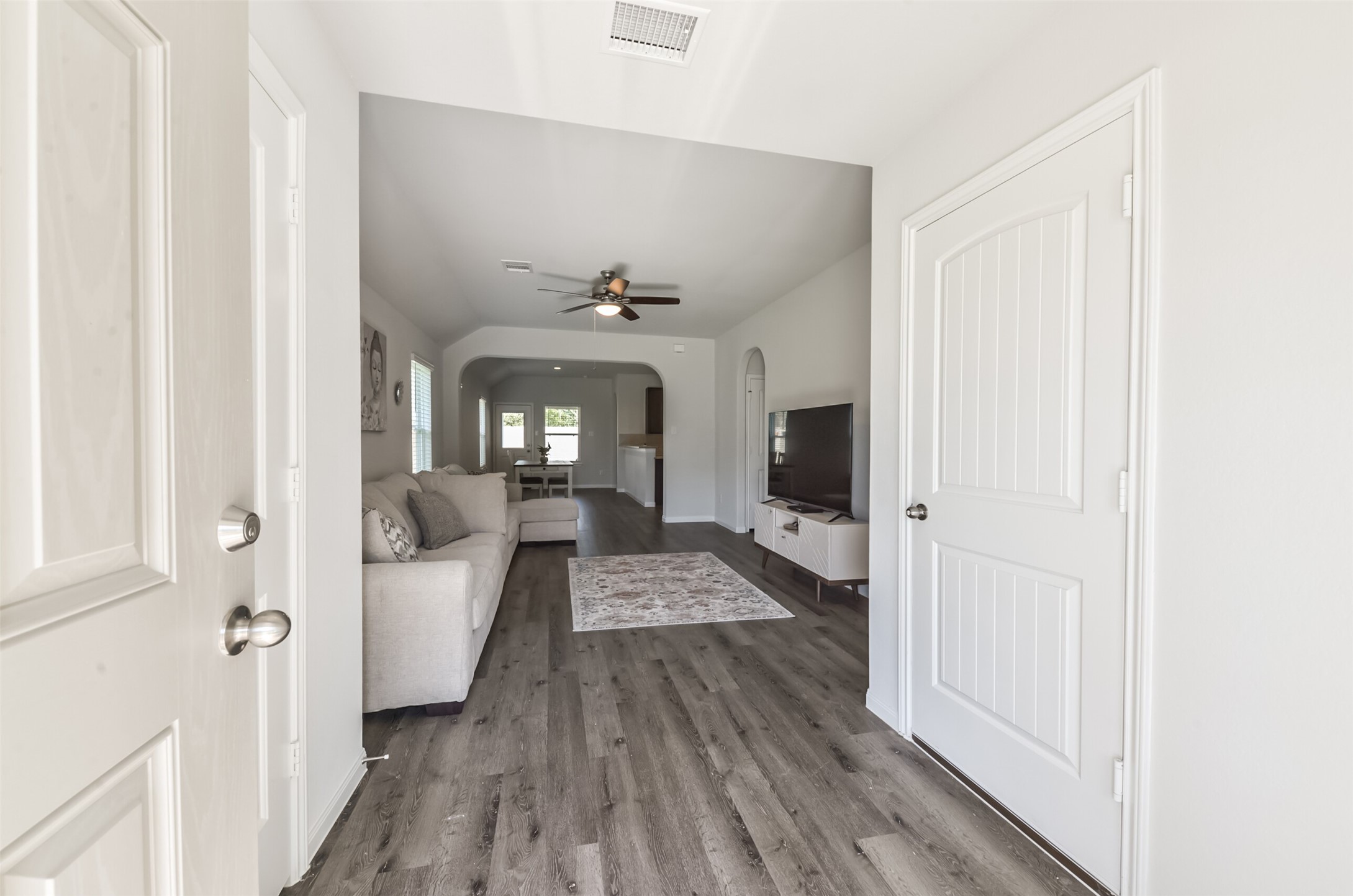 5522 Briana Dee Drive Rosharon, TX 77583 - Photo 6 of 37 a view of a hallway with wooden floor and staircase