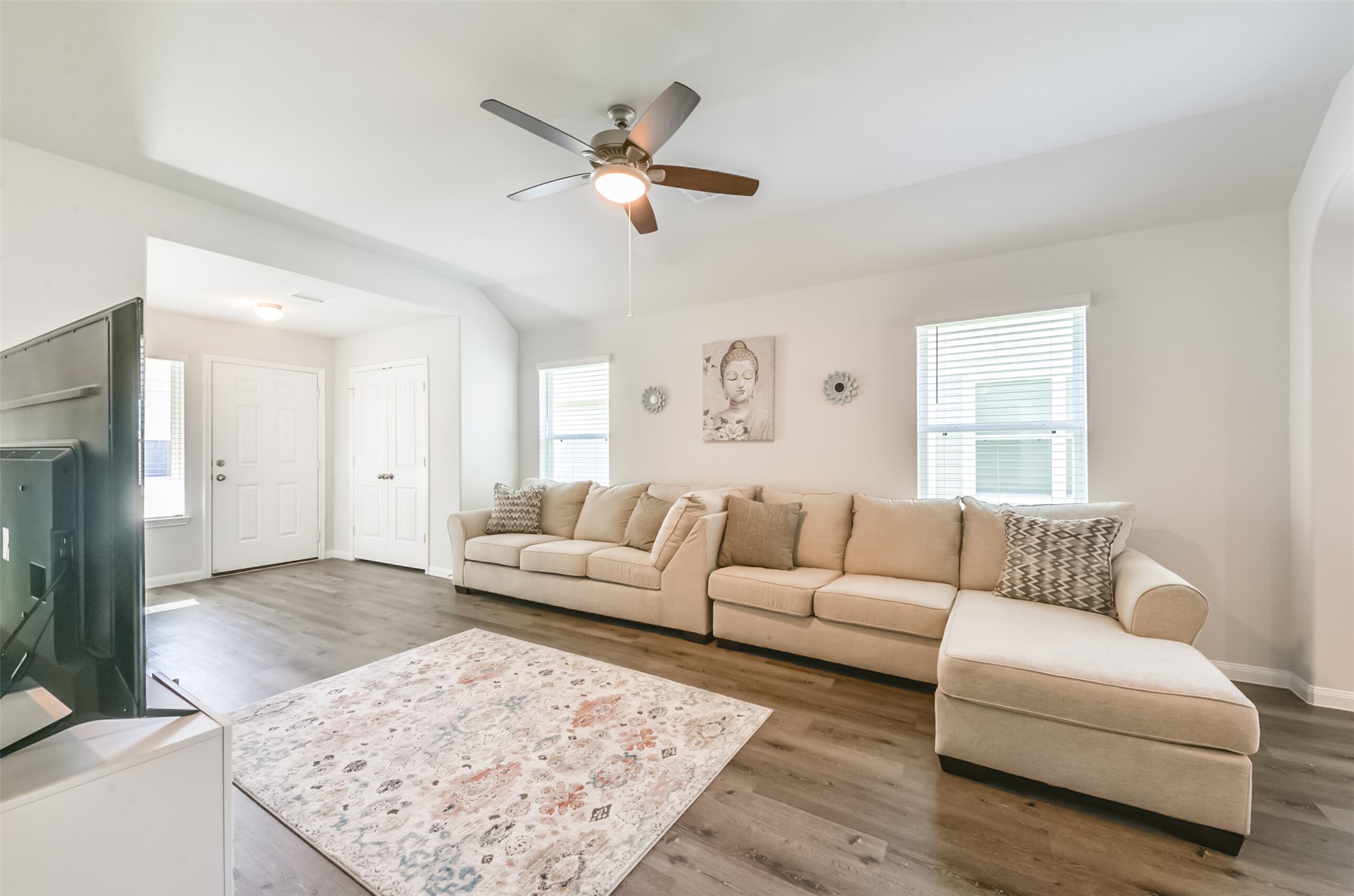 5522 Briana Dee Drive Rosharon, TX 77583 - Photo 9 of 37 a living room with furniture and a rug