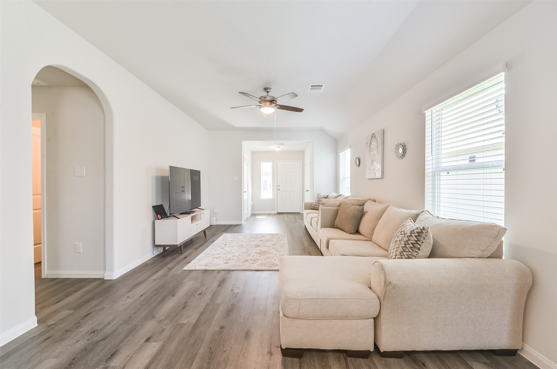 5522 Briana Dee Drive Rosharon, TX 77583 - Photo 10 of 37 a living room with furniture and a flat screen tv