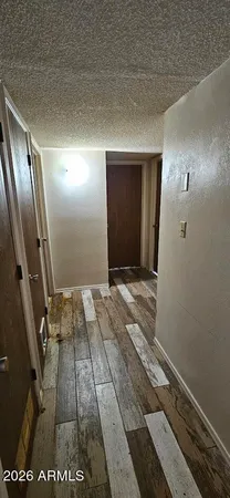a utility room with dryer washer and a refrigerator