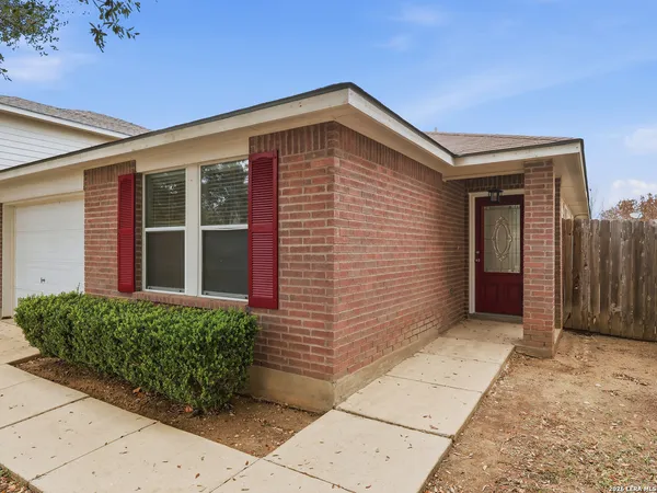 a front view of a house with a garage
