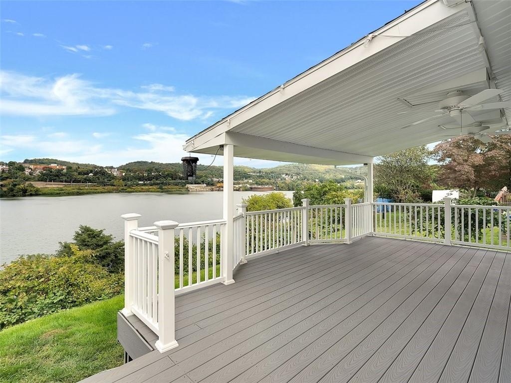 919 Atlantic Avenue Monaca, PA 15061 - Photo 16 of 25 a view of a deck and yard with wooden fence