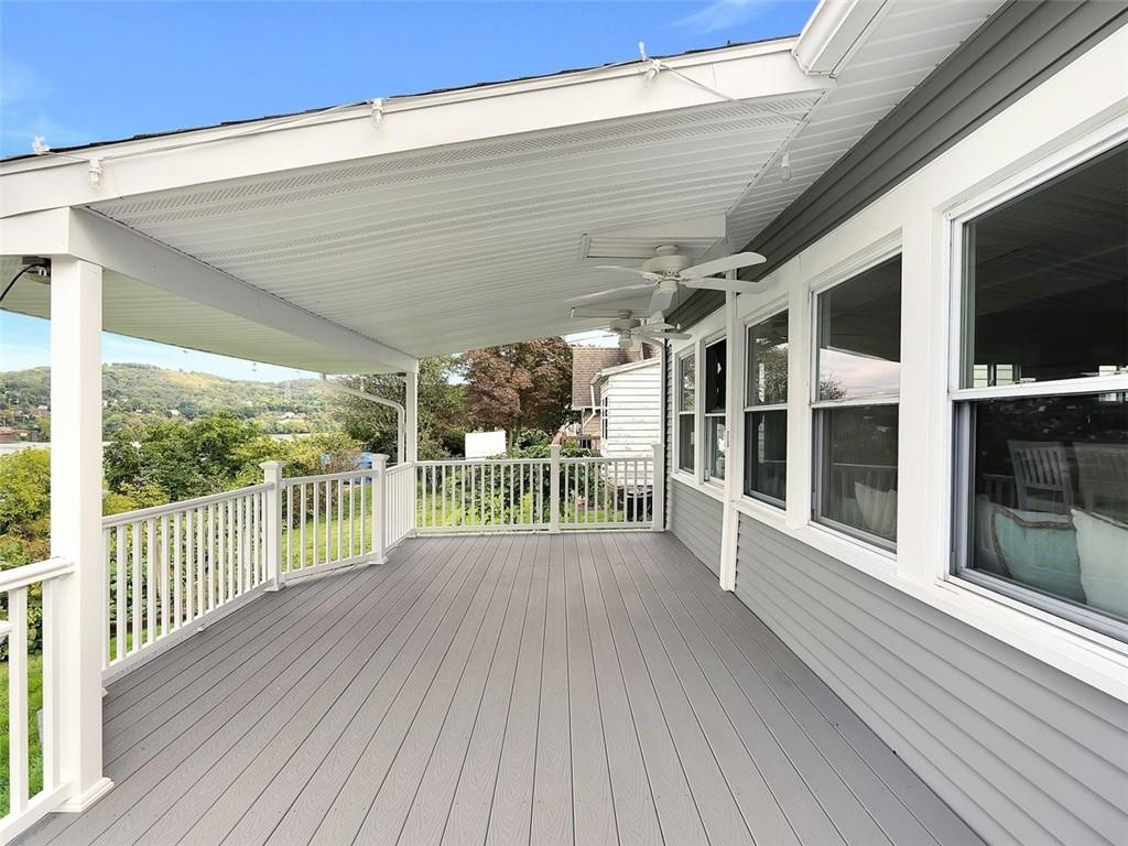 919 Atlantic Avenue Monaca, PA 15061 - Photo 17 of 25 a view of a balcony with wooden floor