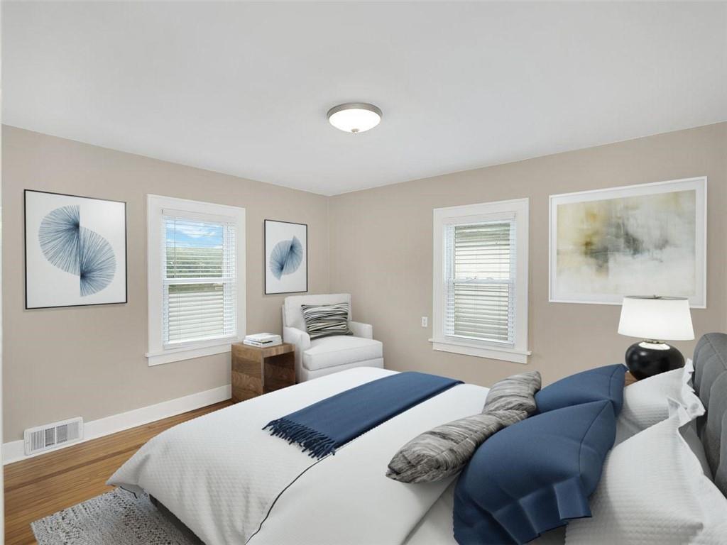 919 Atlantic Avenue Monaca, PA 15061 - Photo 19 of 25 a bedroom with two beds and a window