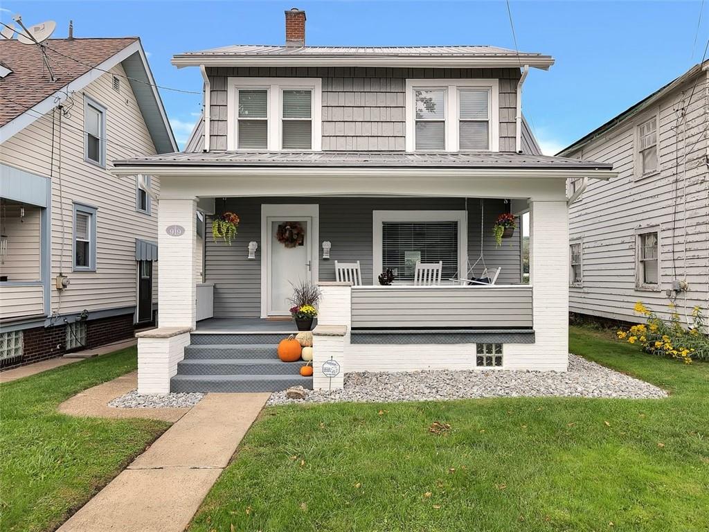 919 Atlantic Avenue Monaca, PA 15061 - Photo 2 of 25 a front view of a house with a yard