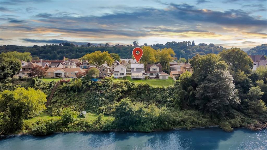 919 Atlantic Avenue Monaca, PA 15061 - Photo 3 of 25 a view of a houses with a yard