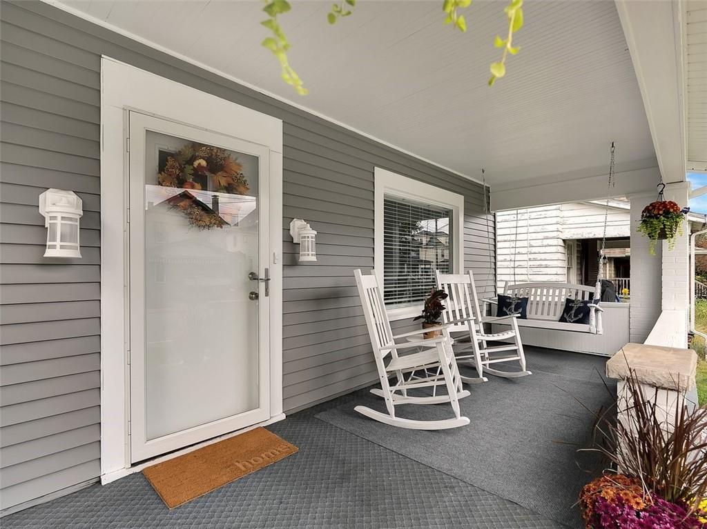 919 Atlantic Avenue Monaca, PA 15061 - Photo 5 of 25 a dining room with furniture and a chandelier