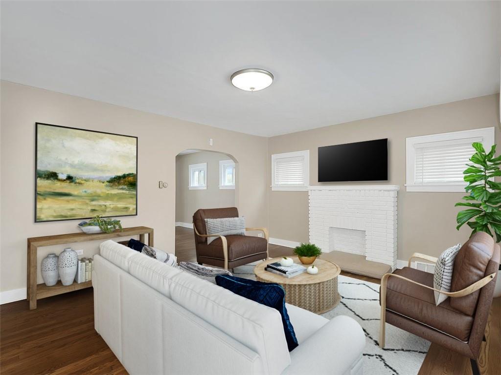 919 Atlantic Avenue Monaca, PA 15061 - Photo 6 of 25 a living room with furniture and a flat screen tv