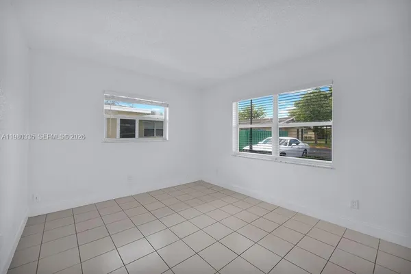 a view of a room that has a window in it