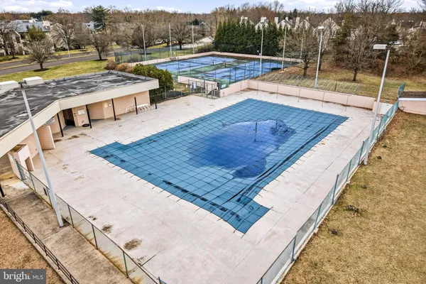 a wooden floor with a view of a living room