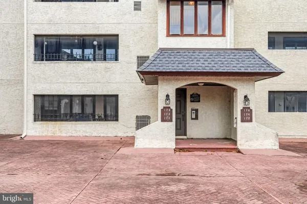 a front view of a house with yard