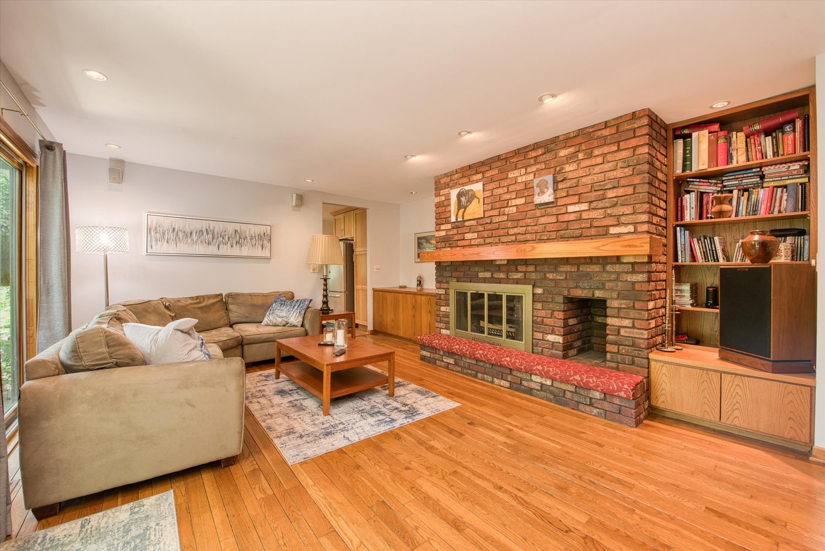 1196 Nottingham Lane Elgin, IL 60120 - Photo 21 of 45 a living room with furniture fireplace and a flat screen tv