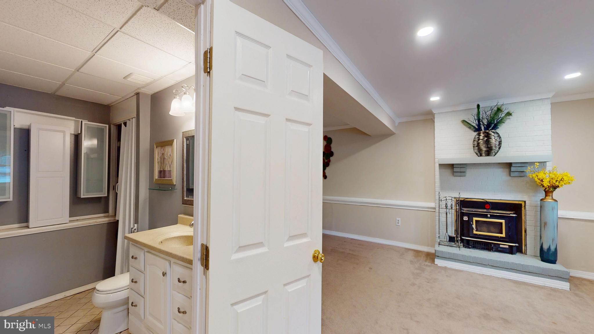 11707 Balsamwood Terrace Laurel, MD 20708 - Photo 28 of 32 view of lower level family room and bath