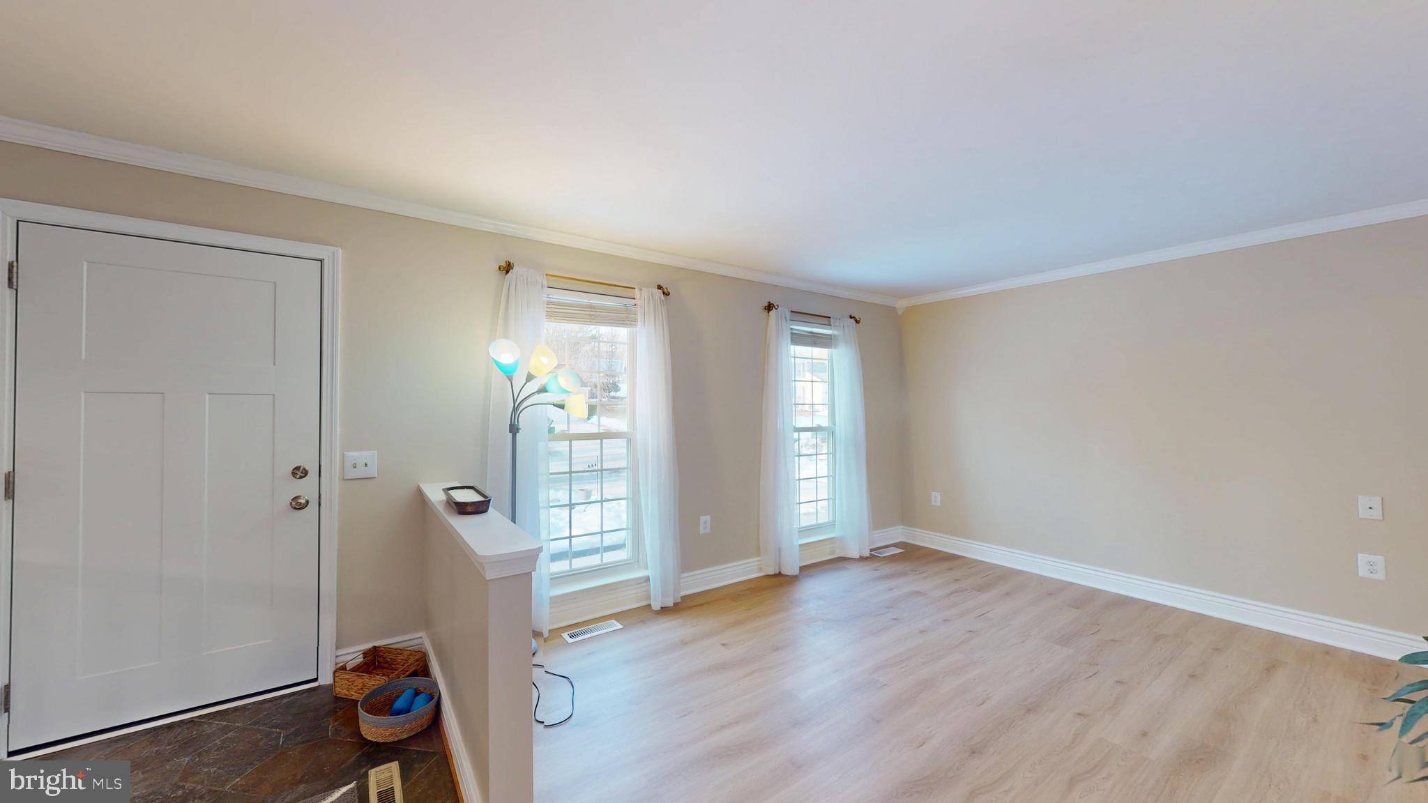 11707 Balsamwood Terrace Laurel, MD 20708 - Photo 7 of 32 view from stairs to entry and living room