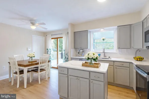 a kitchen with a sink cabinets and counter space