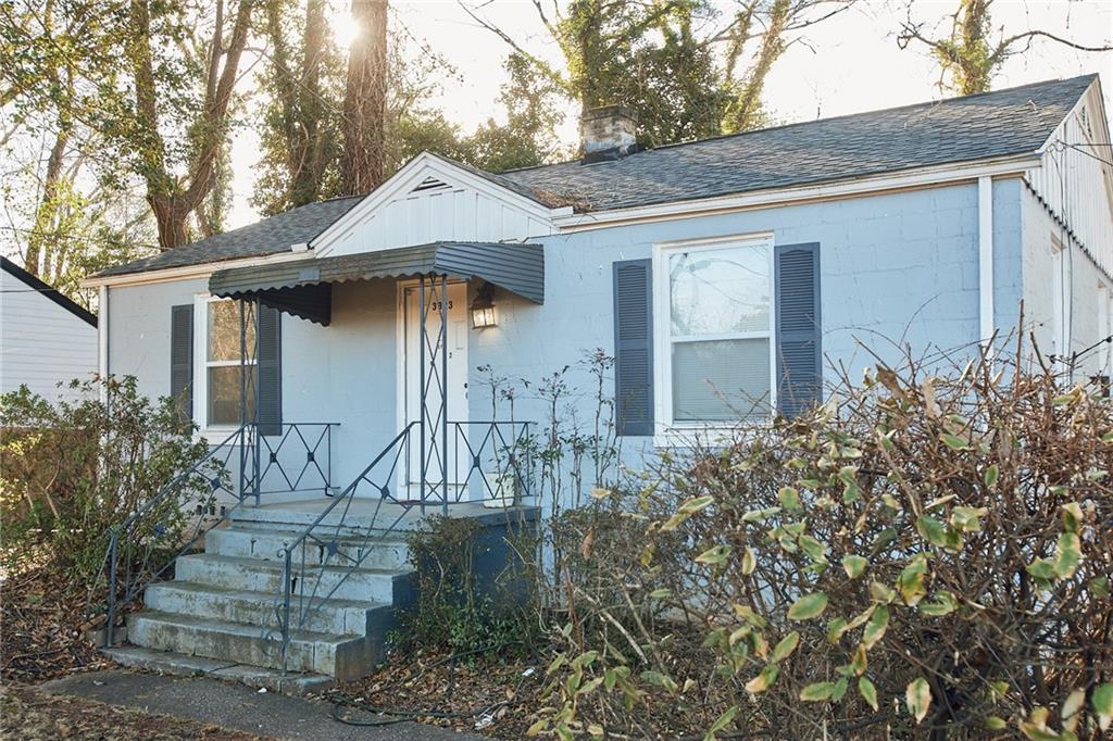 3323 Midway Road, Unit 1 Decatur, GA 30032 - Photo 2 of 10 a front view of house with a garden