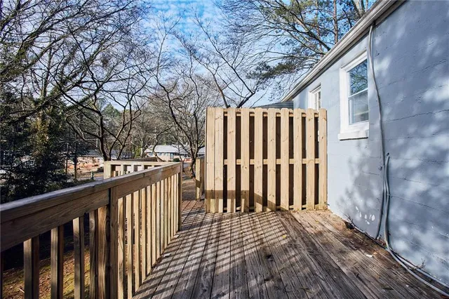 a view of a wooden street from a balcony