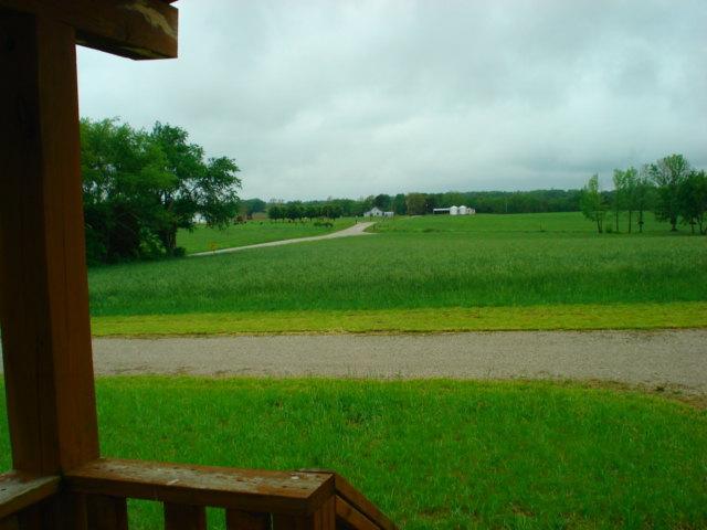 4646 Summitville Road Morrison, TN 37357 - Photo 10 of 11 a view of a golf course with a lake