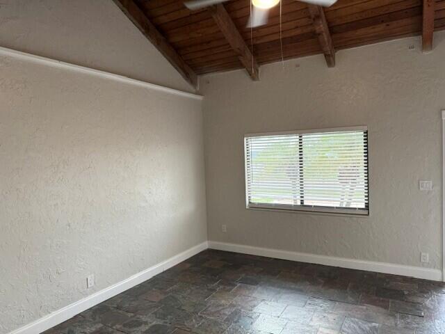 103 Northeast 28th Street Boca Raton, FL 33431 - Photo 5 of 47 a view of an empty room with a window