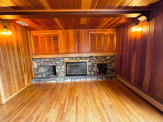 a view of a door and a window