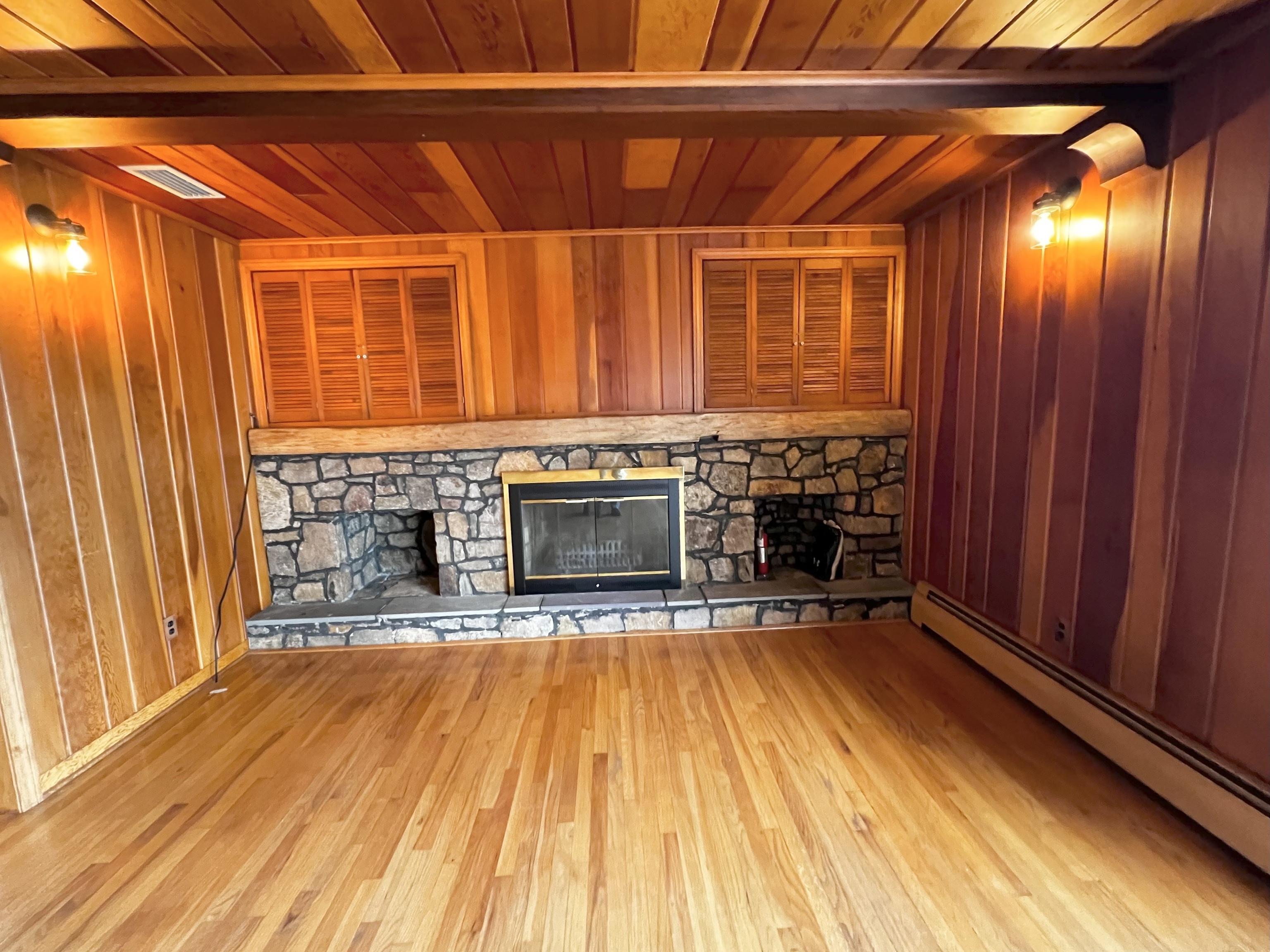 524 Saybrook Road Haddam, CT 06438 - Photo 16 of 38 a view of front door with livingroom and fireplace