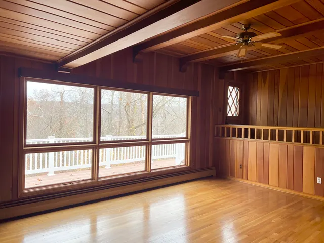 a view of a kitchen with furniture and a fireplace