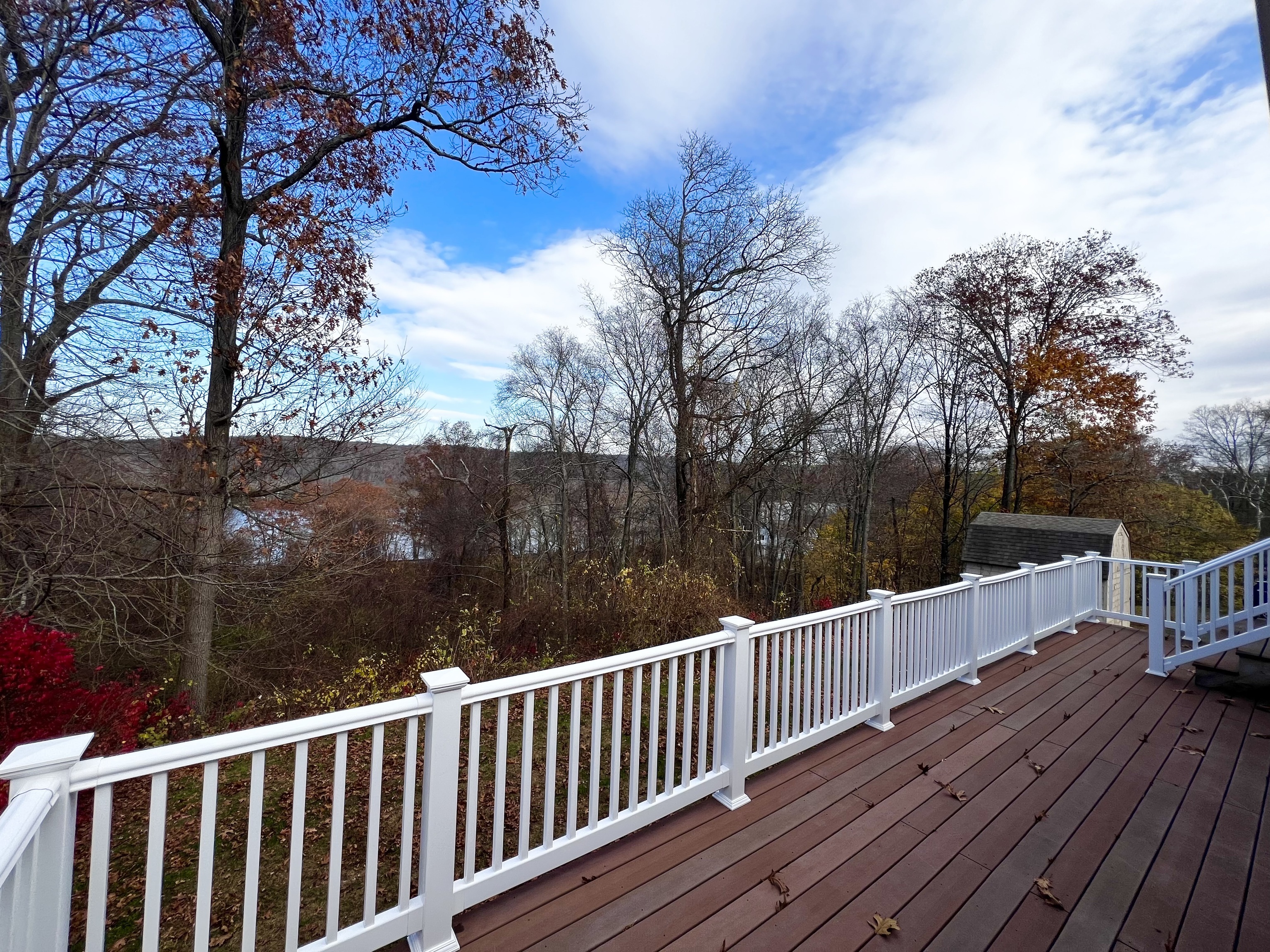 524 Saybrook Road Haddam, CT 06438 - Photo 2 of 38 a view of deck with wooden floor and trees