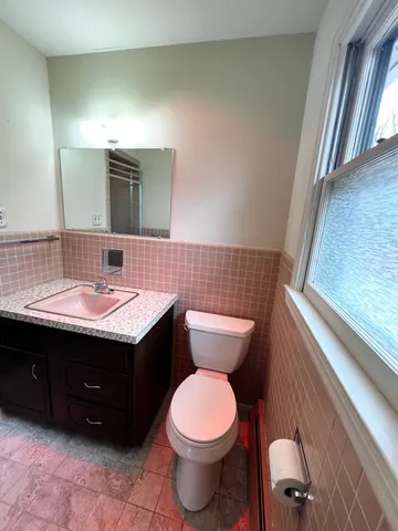 a bathroom with a sink and a toilet