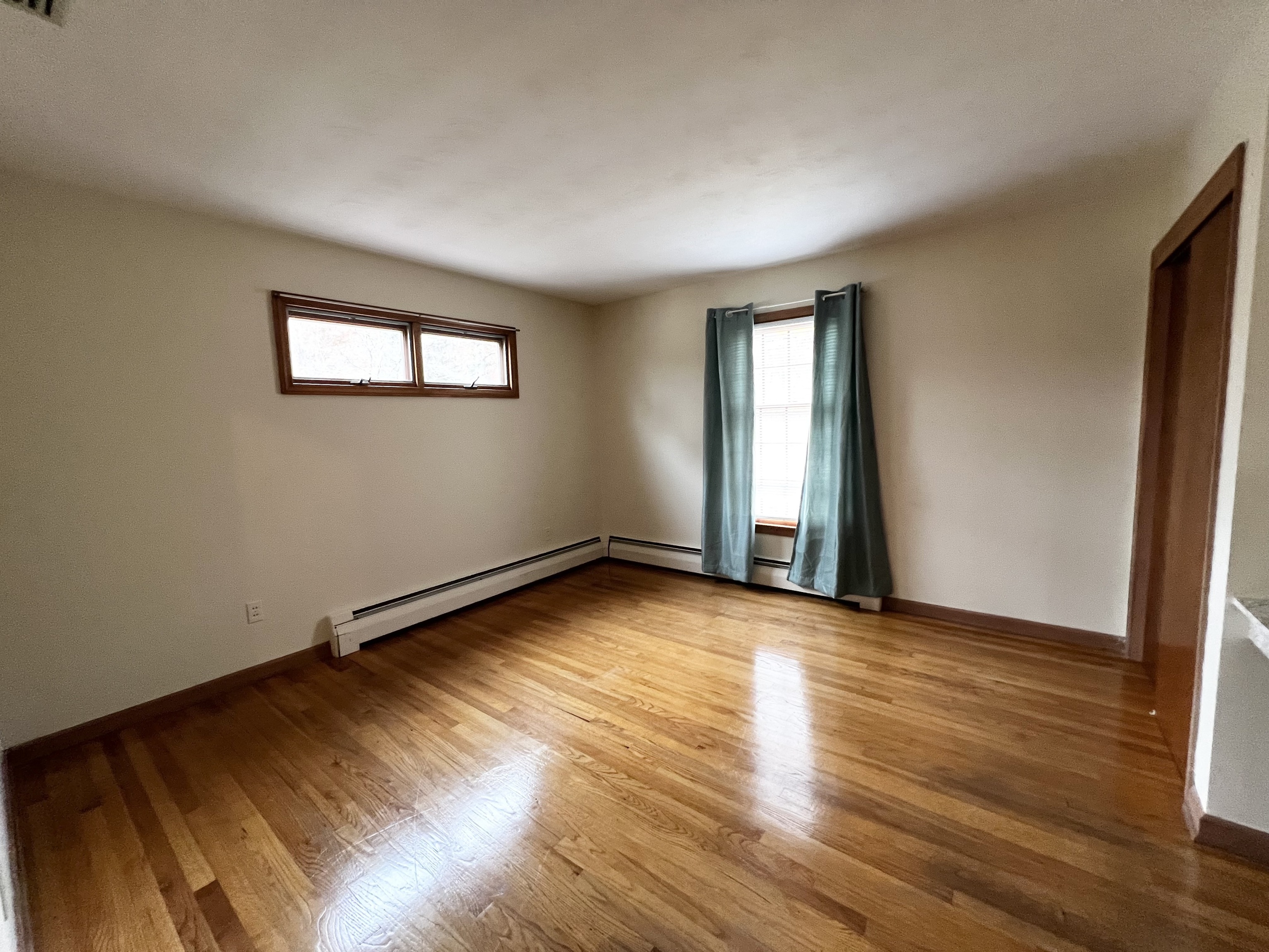 524 Saybrook Road Haddam, CT 06438 - Photo 27 of 38 an empty room with wooden floor and windows