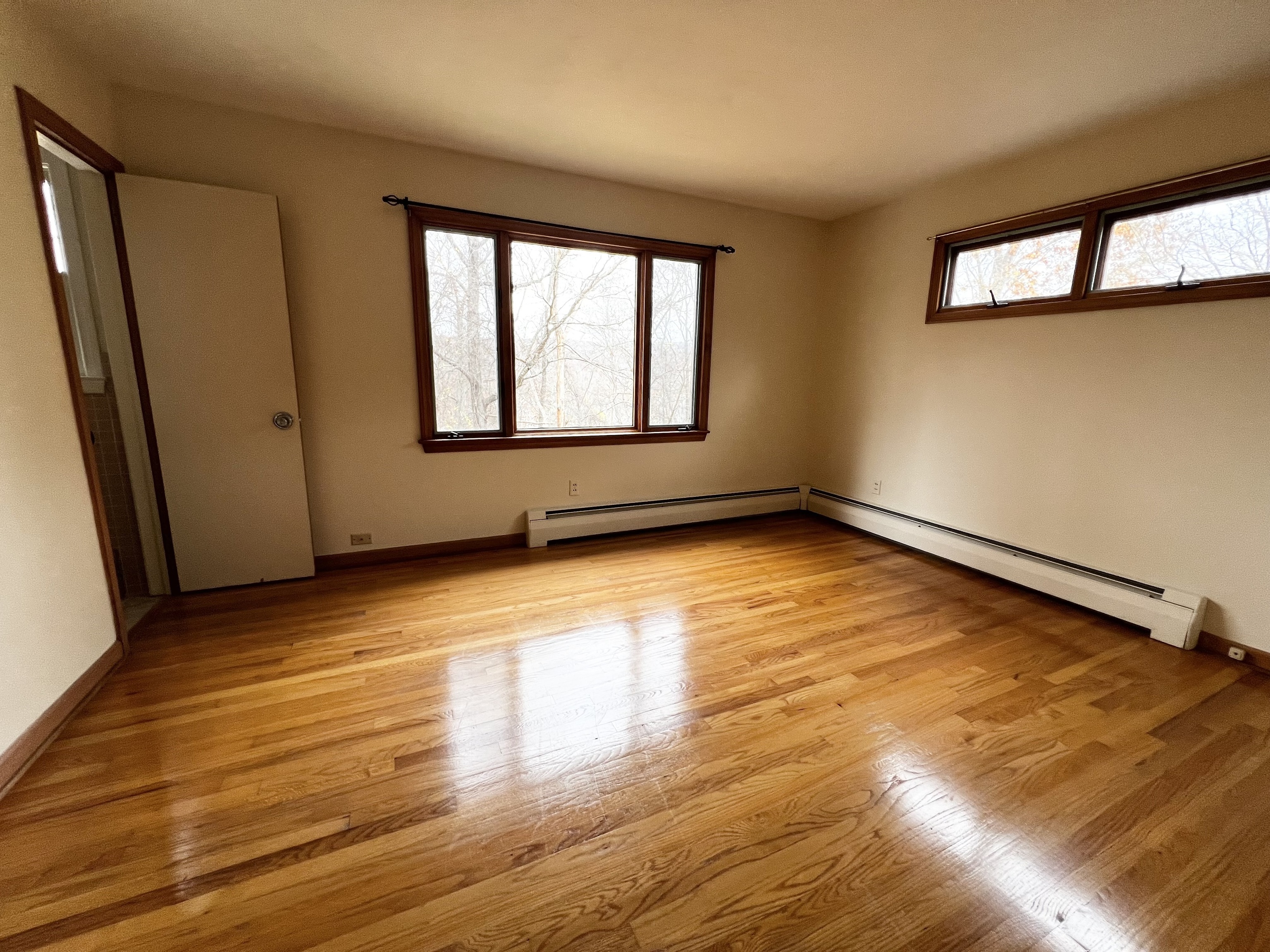 524 Saybrook Road Haddam, CT 06438 - Photo 30 of 38 an empty room with wooden floor and windows
