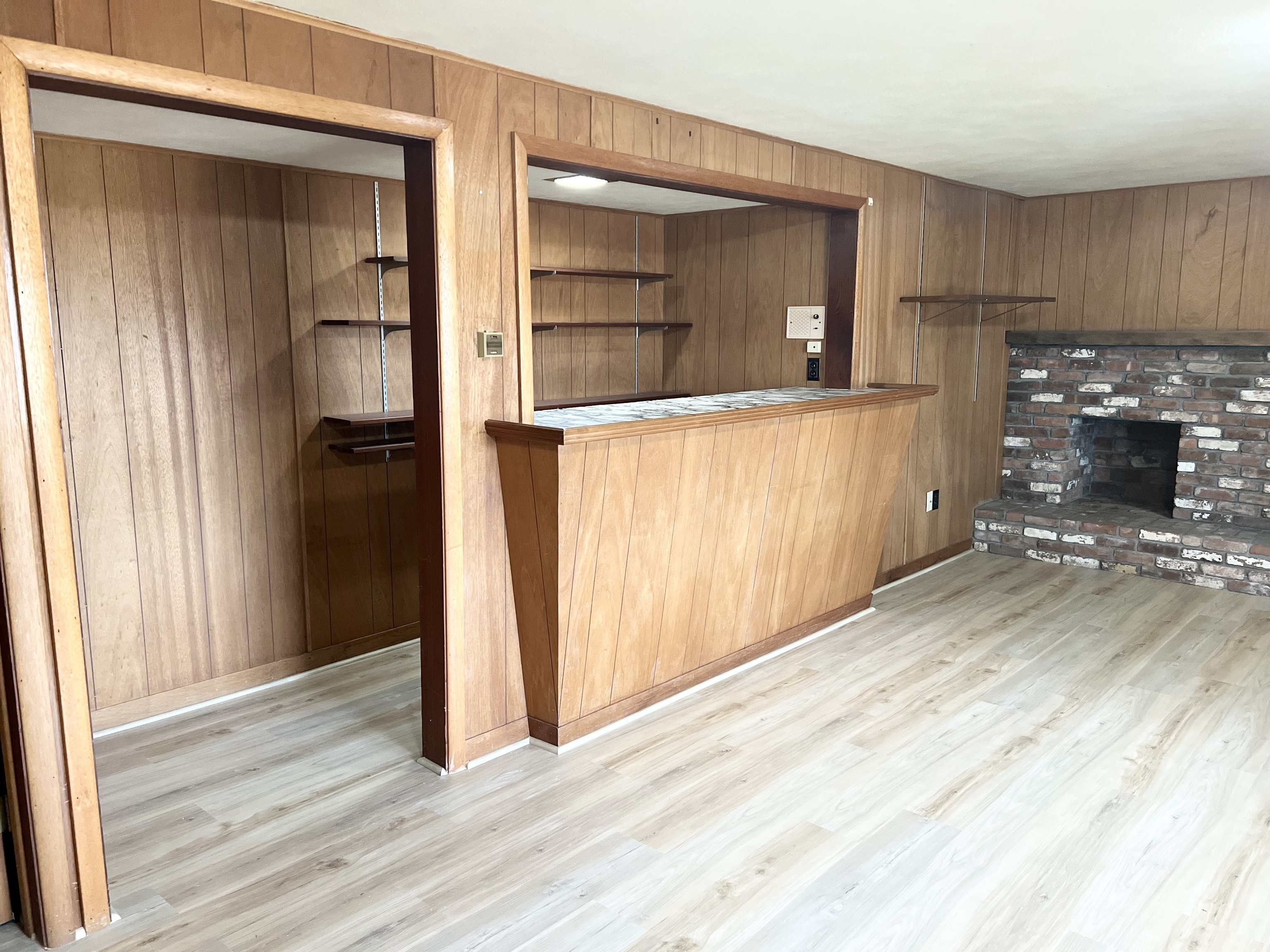 524 Saybrook Road Haddam, CT 06438 - Photo 32 of 38 a view of a kitchen with wooden floor and a refrigerator
