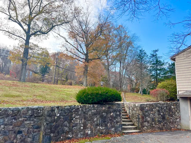 a kitchen with a sink stove and microwave