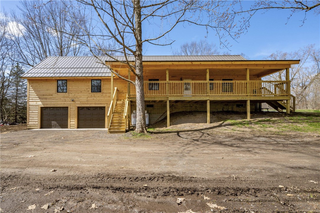 2912-2932 Stevens Street Manchester, NY 14432 - Photo 7 of 20 Log sided home with an addition added