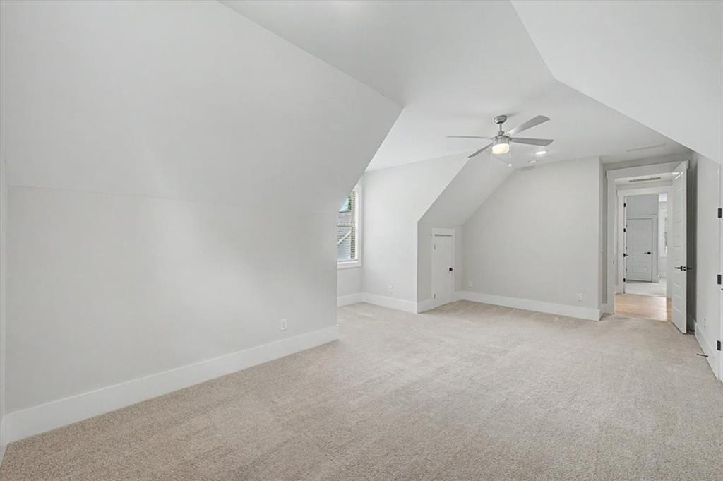 217 Laura Lake Road Marietta, GA 30066 - Photo 40 of 54 a view of an empty room with a ceiling fan