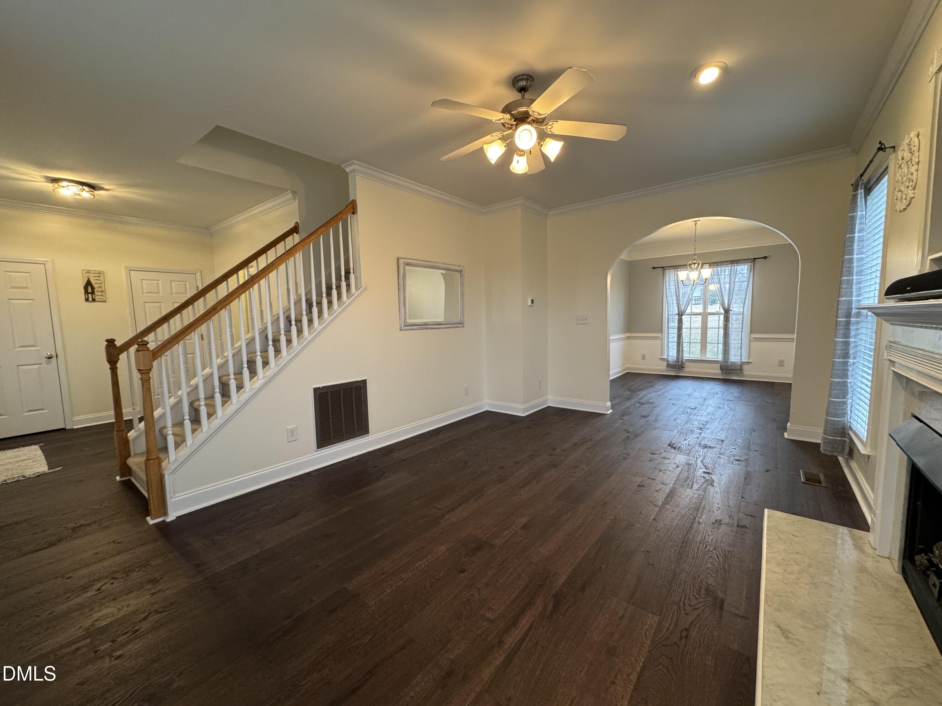 51 Water Front Lane Timberlake, NC 27583 - Photo 21 of 57 a view of a livingroom with wooden floor and staircase