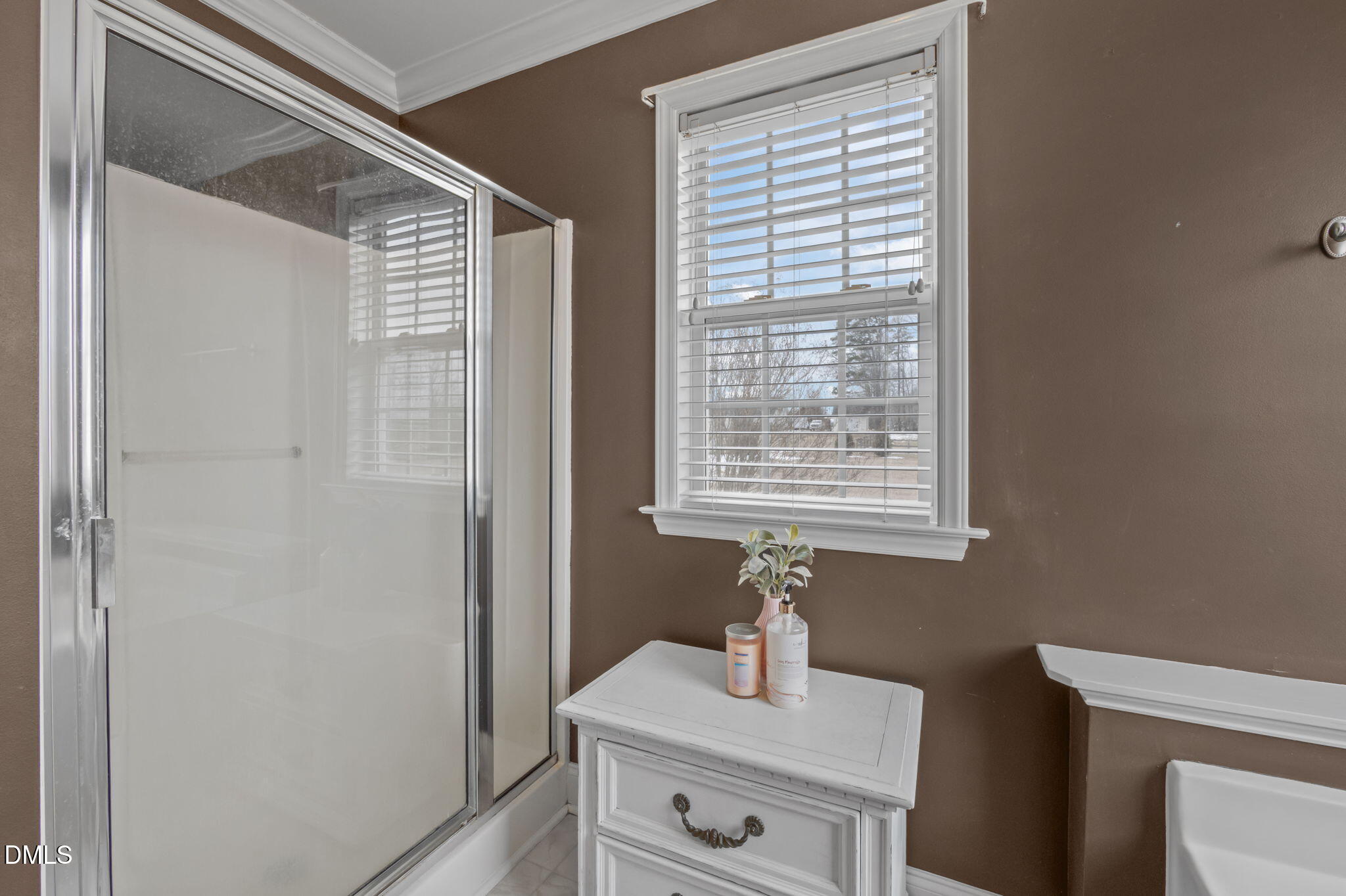 51 Water Front Lane Timberlake, NC 27583 - Photo 24 of 57 a bathroom with a sink and a mirror