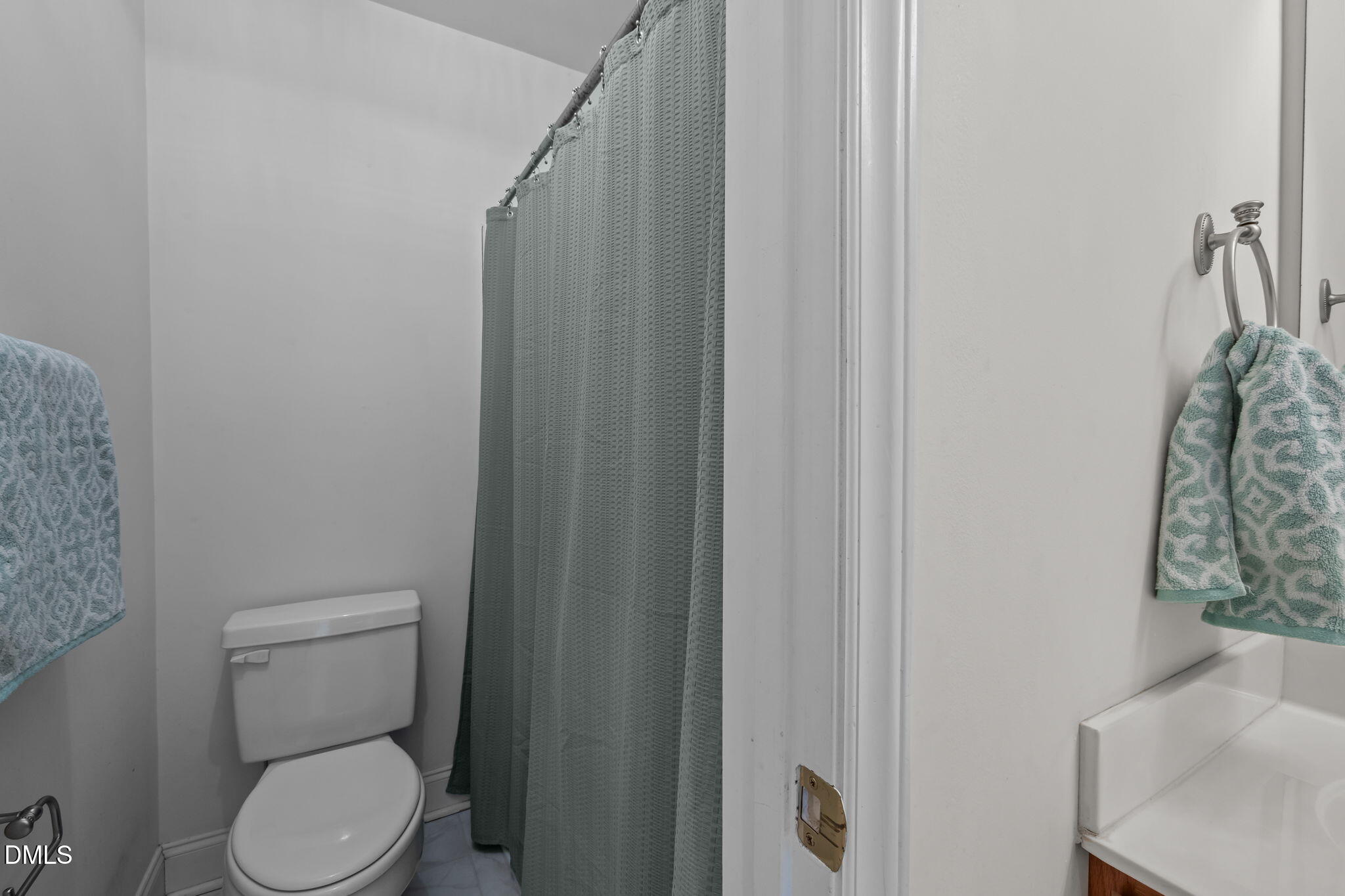 51 Water Front Lane Timberlake, NC 27583 - Photo 28 of 57 a white toilet sitting next to a shower