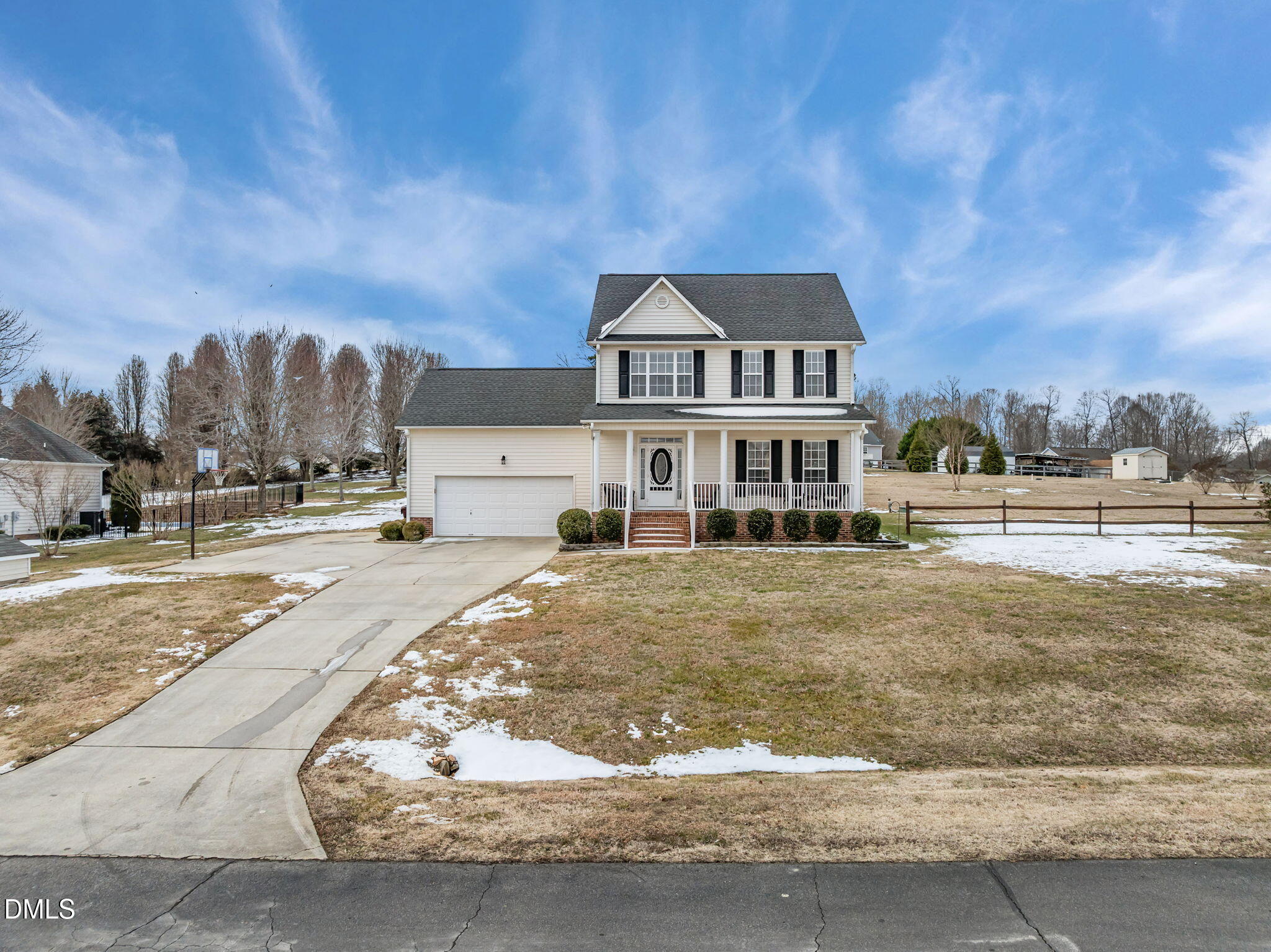 51 Water Front Lane Timberlake, NC 27583 - Photo 40 of 57 a view of a big house with a yard