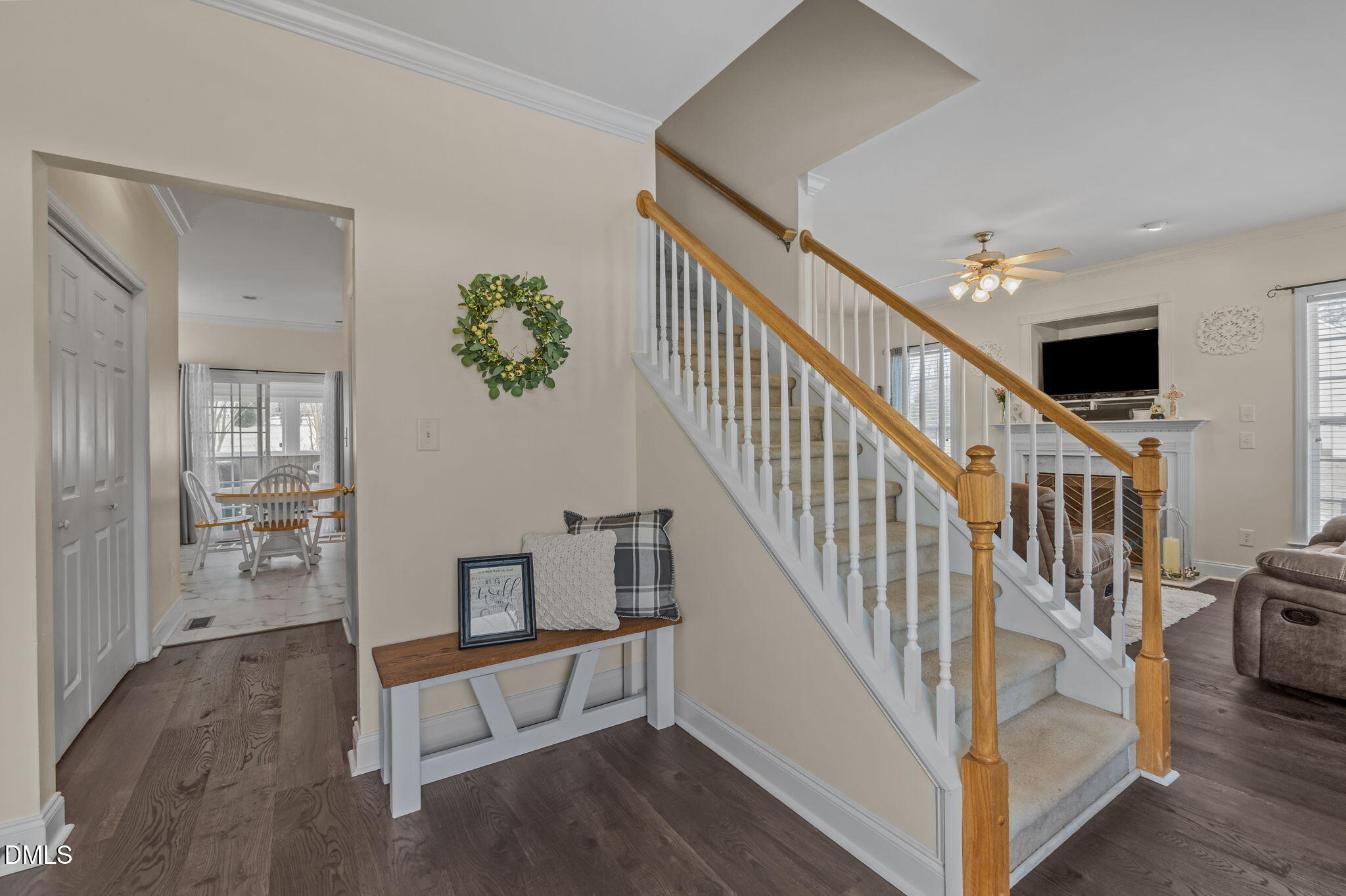 51 Water Front Lane Timberlake, NC 27583 - Photo 5 of 57 a view of staircase with lots of frames and flower vase