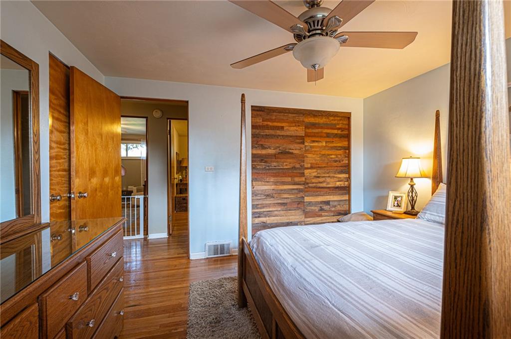 971 Lyn Road Sarver, PA 16055 - Photo 14 of 25 Master bedroom hosts two closets, one finished with a custom door.