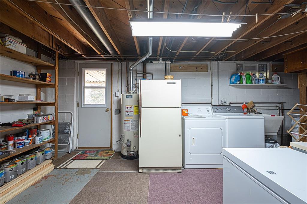 971 Lyn Road Sarver, PA 16055 - Photo 22 of 25 Laundry and more storage space can be found in this walk out basement.