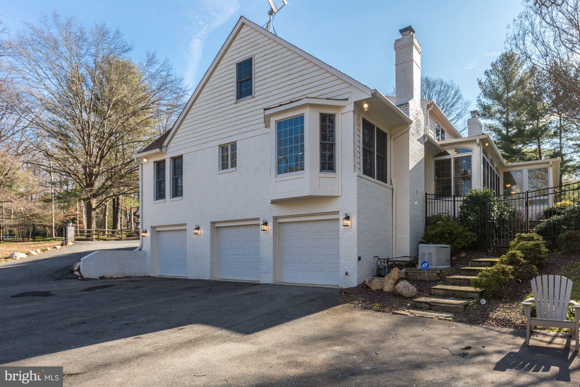 8821 Belmart Road Potomac, MD 20854 - Photo 46 of 52 Garage entrances. Space for 5 cars
