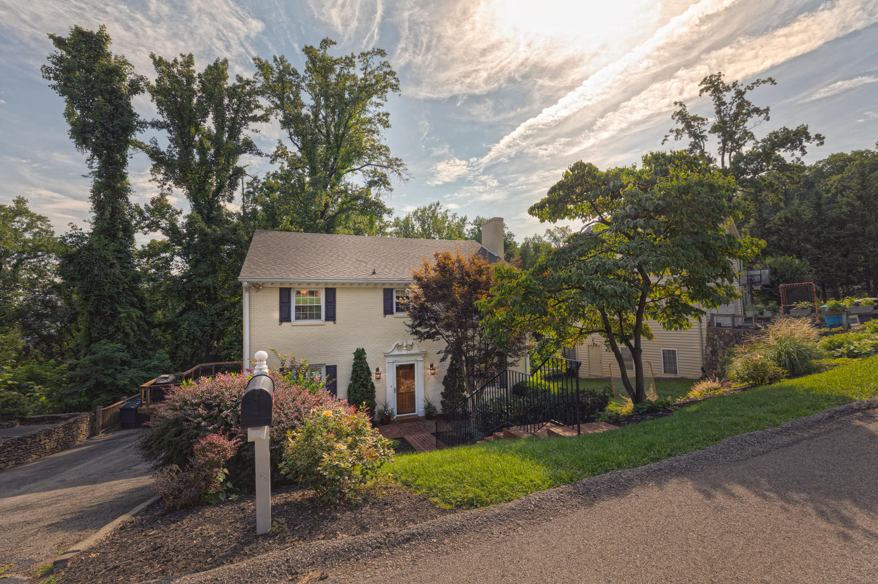 201 Parkcrest Road Southwest Roanoke, VA 24014 - Photo 1 of 39 a view of a house with a small yard and a large tree