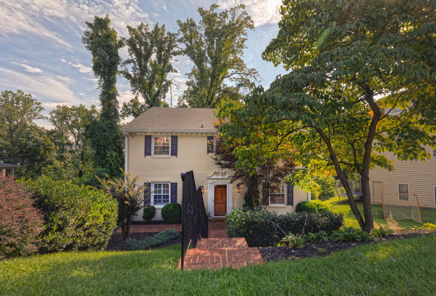 201 Parkcrest Road Southwest Roanoke, VA 24014 - Photo 2 of 39 a front view of a house with a yard and a tree